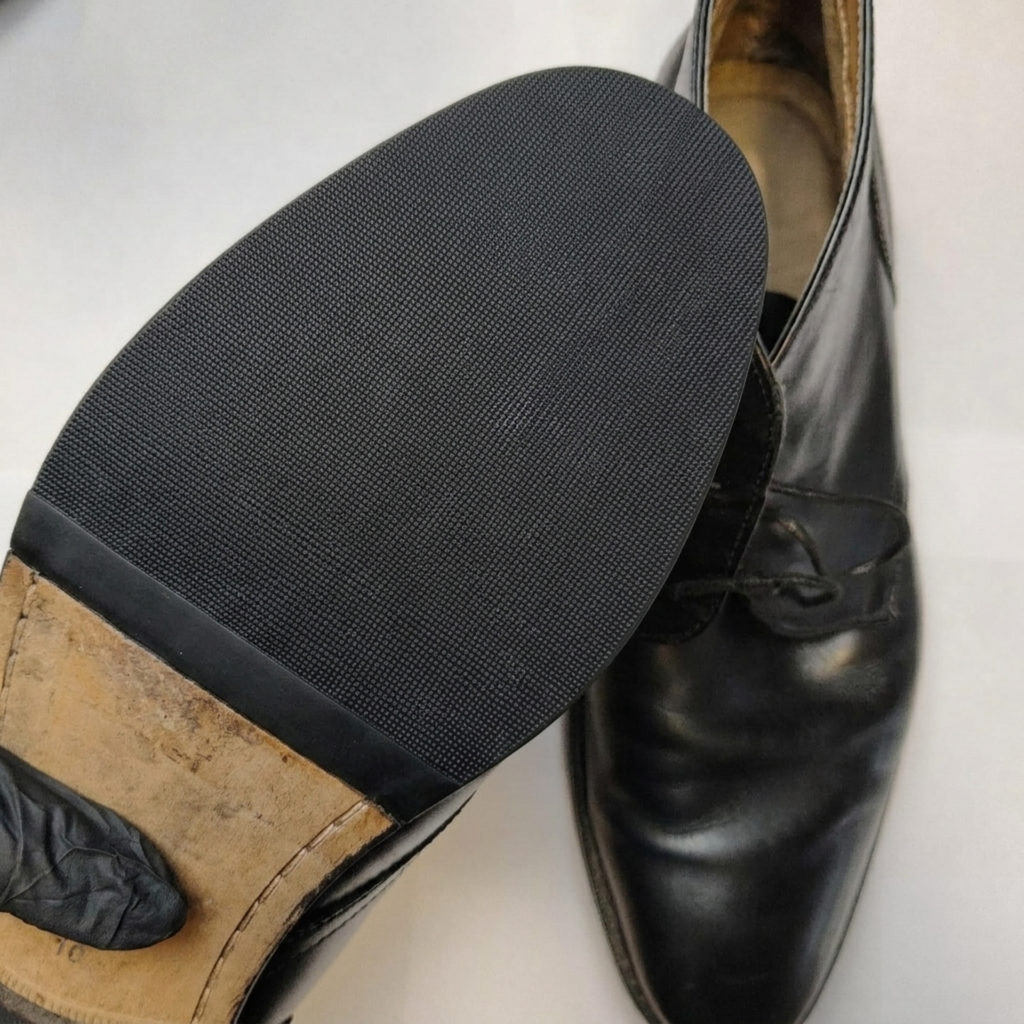 Servicio de Reparación: Media Planta de Caucho en Zapatos