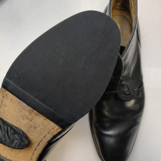 Servicio de Reparación: Media Planta de Caucho en Zapatos